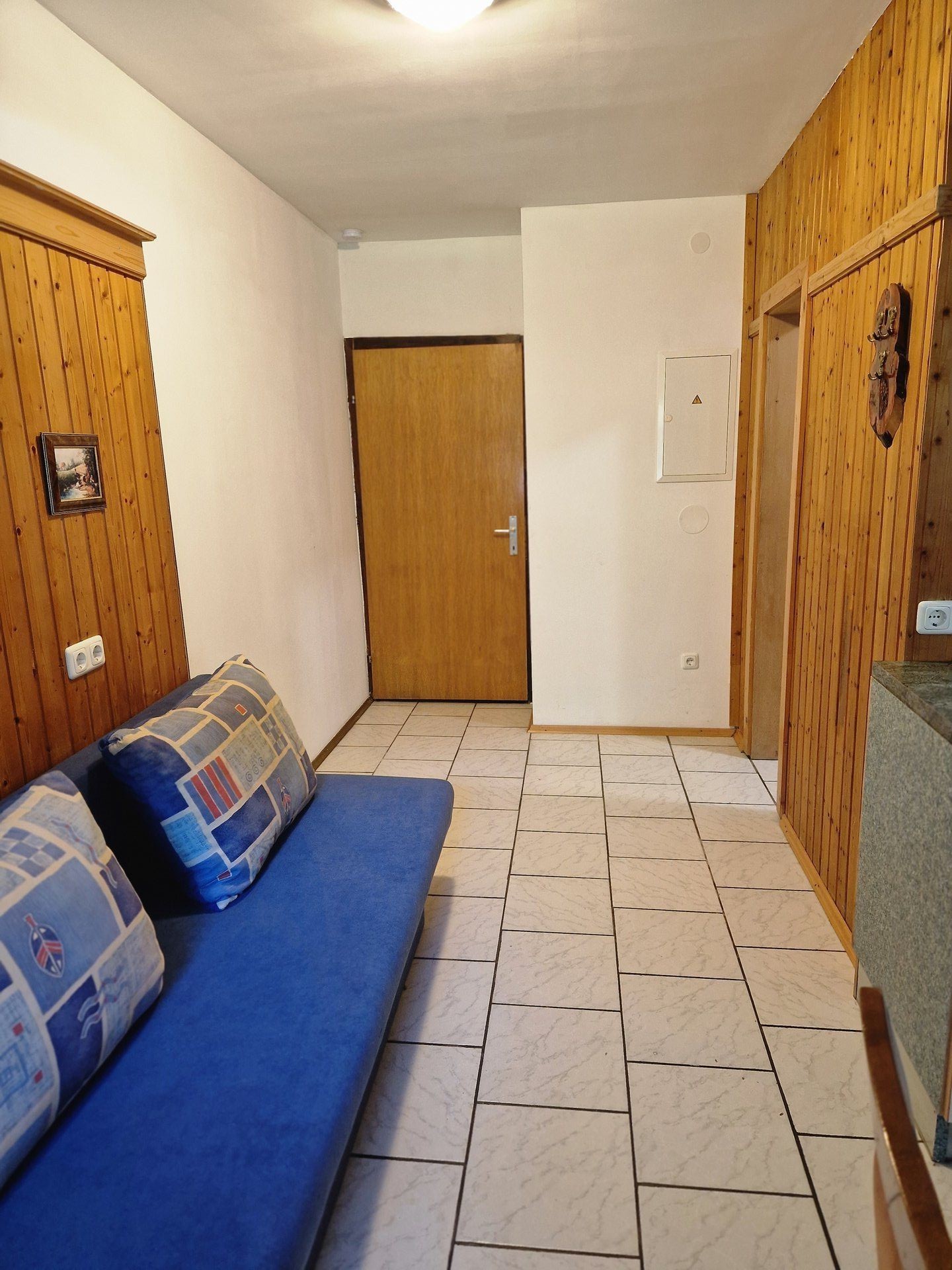 Zaunerhof Appartement 5 - Authentisches Wohnzimmer mit Holzdecke